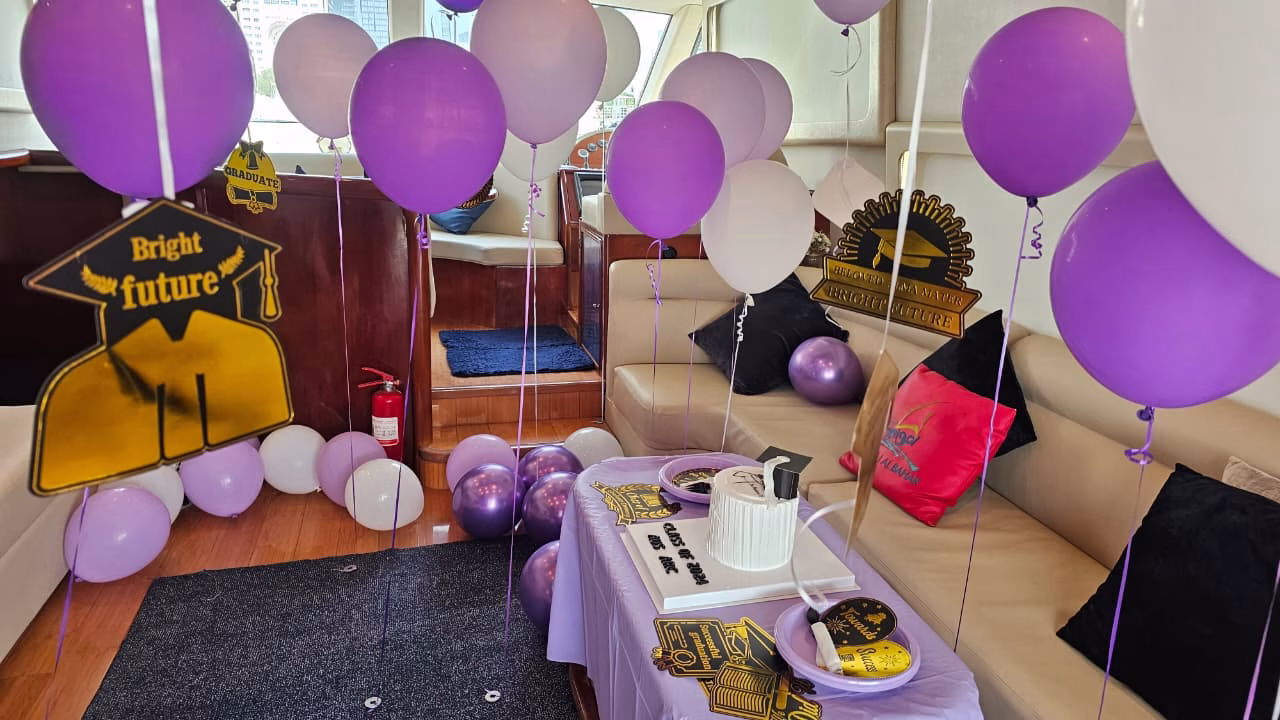 Graduation yacht decorations Dubai Marina view